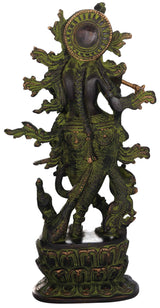 Handmade green brass Krishna idol with flute, detailed face and halo-like crown