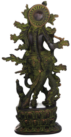 Handmade green brass Krishna idol with flute, detailed face and halo-like crown