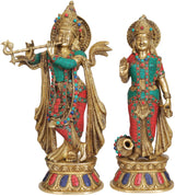 Handmade brass Krishna–Radha statue with colorful inlay, front view, detailed jewelry