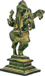 Front view small brass Dancing Ganesha figurine on ornate pedestal