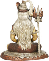Shiva brass idol from behind, seated with trident, white draped cloth and tiger base