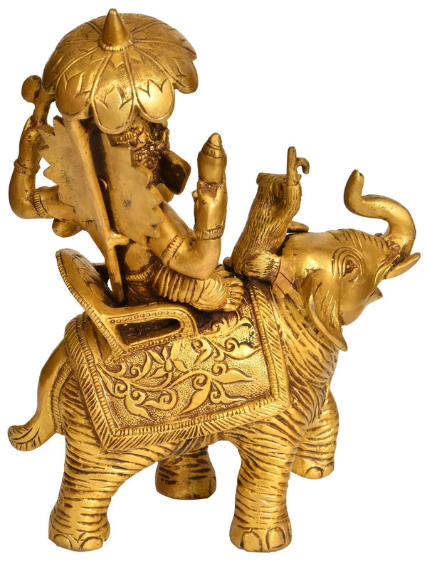 Brass Ganesha Idol Seated on an Elephant with His Mushak 9 inches Entryway Setting