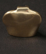 1-inch brass Ganesha statue, back view with smooth rounded body and crown