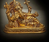 Ornate brass Ganesha statue, relaxed blessing pose with raised hands and trunk