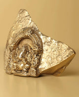 Natural brass Ganesha temple idol, detailed trunk and headdress in arched frame