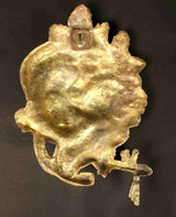 Brass back of Krishna face wall hanging with hanging loop and keyhole cutouts
