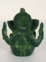 Ganpati Maharaj figurine back view, green painted brass with ornate circular medallion