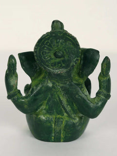 Ganpati Maharaj figurine back view, green painted brass with ornate circular medallion