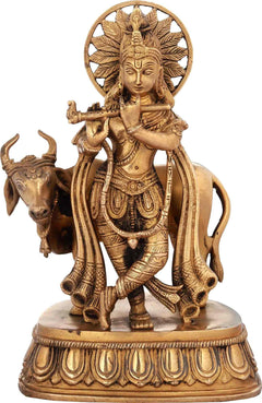 Handcrafted natural brass Krishna statue holding cow, 10 inches tall