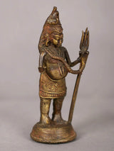 Small brass Lord Shiva statue, 4 inches, side view holding a tall trident