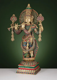 Standing brass Krishna playing flute sculpture with red-blue jeweled ornaments, 24 in