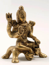 Small brass Lord Shiva statue in blessing pose, detailed jewelry, trident hand.