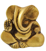 Natural brass Ganesha statue, stylized seated figure with ornate detailing, 2 in