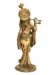 Back view of Lord Krishna brass statue holding flute with ornate crown, 9-inch tall