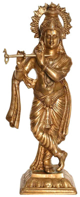 Brass Krishna statue playing flute, ornate crown, standing pose