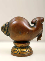 Back view small brass Ganesha conch statue on pedestal base, engraved details