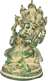 Brass Ganesha with raised arms on Shesha Naga, mudgreen finish, 5 inch