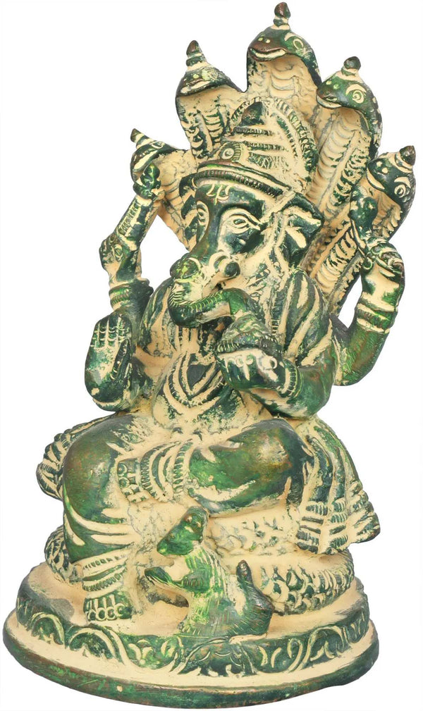Small brass mudgreen sculpture of Ganesha seated on the Shesha Naga 5 inches Entryway Setting