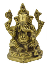 Small brass statue of Bhagawan Ganesha, seated with raised arms, 7 cm