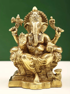 Brass Raja Ganpati statue, seated deity with raised hands and detailed crown, 5 in