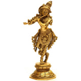 Brass Krishna flute-playing statue, 9 cm, ornate gold-tone detailing