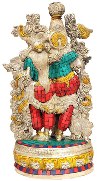 Radha-Krishna brass statue back view, ornate filigree with teal and red mosaic attire