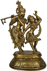 Brass Radha and Krishna dancing statue, Krishna with flute, Radha with raised arms, 15 cm