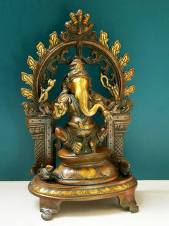 AONA brass Ganesha blessing statue, detailed face, seated on ornate base