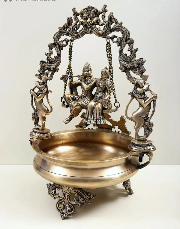 Brass Urli with Radha Krishna on a Swing 21 Inches Entryway Setting