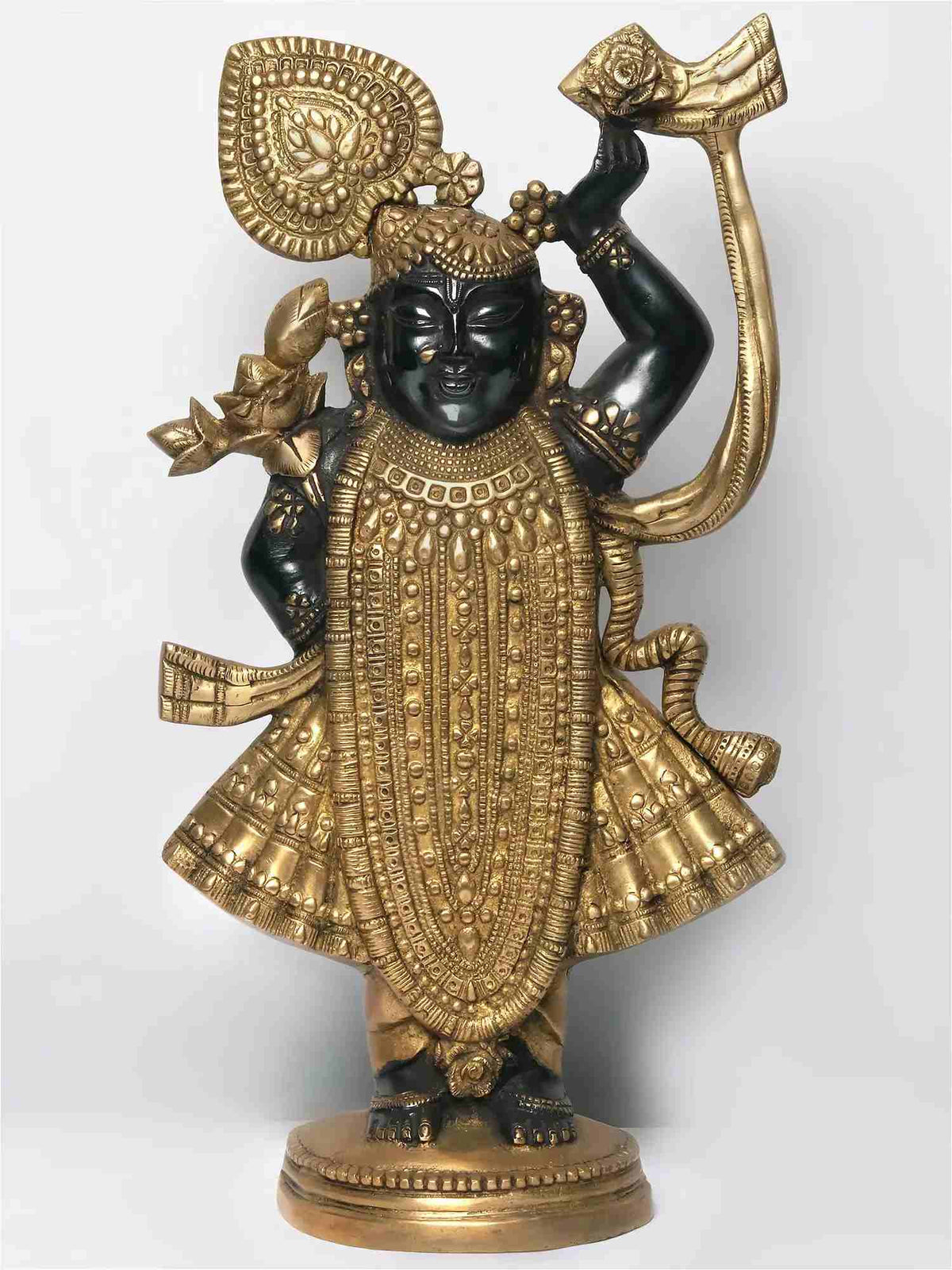 Gold and black brass Krishna statue as Shrinath Ji, ornate crown and raised hand