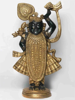 Gold and black brass Krishna statue as Shrinath Ji, ornate crown and raised hand