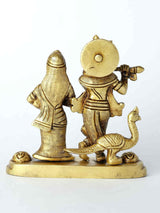 Brass Radha and Krishna statue from side view, Krishna playing with small peacock
