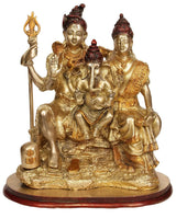 Brass Shiva-Parvati and Ganesha statue, close-up front angle, on dark red base