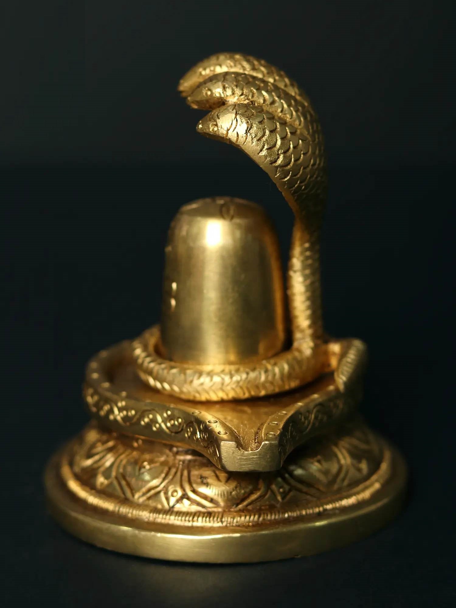 Brass Shiva Linga Decorated with Majestic Sheshnag 4 inches