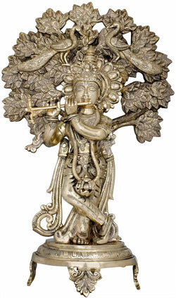 Brass Statue of Krishna Playing the Flute Beneath a Tree with Peacocks