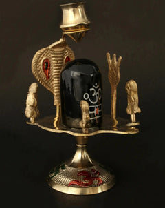 Black Stone Shiva linga idol with brass Shiva family figures, 6cm