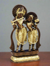 Brass Radha-Krishna sculpture, Krishna playing flute with Radha standing close