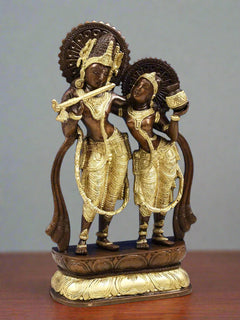 Brass Radha-Krishna sculpture, Krishna playing flute with Radha standing close