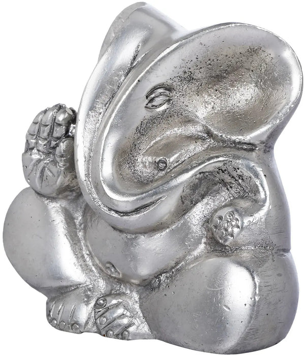 Stylized Brass Ganesha Small Statue 2 inches Entryway Setting