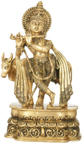 Handmade brass sculpture: Krishna plays flute beside cow, ornate detailing, 19 in