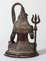 Back view 6-inch brass Lord Shiva idol seated, tall hair styling and trident