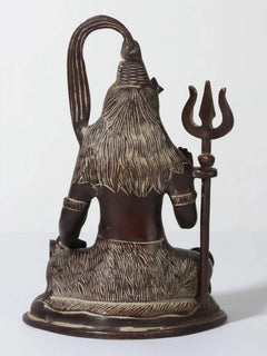 Back view 6-inch brass Lord Shiva idol seated, tall hair styling and trident