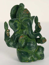 Brass Ganpati Maharaj idol, profile view with elephant face, painted green finish