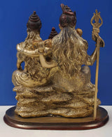 Brass Shiva-Parvati and Ganesha statue, rear/side angle with trident, on base