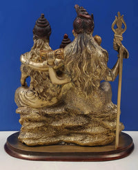 Brass Shiva-Parvati and Ganesha statue, rear/side angle with trident, on base
