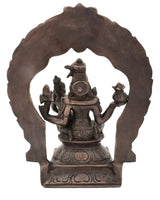 Antique brass Shiva-Parvati idol view from behind on carved arch base throne