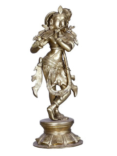 Brass Lord Shri Krishna flute-playing statue on round base, 20.5 cm