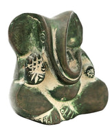 2-inch brass Ganesha statue front-left view, trunk and seated legs with om symbols
