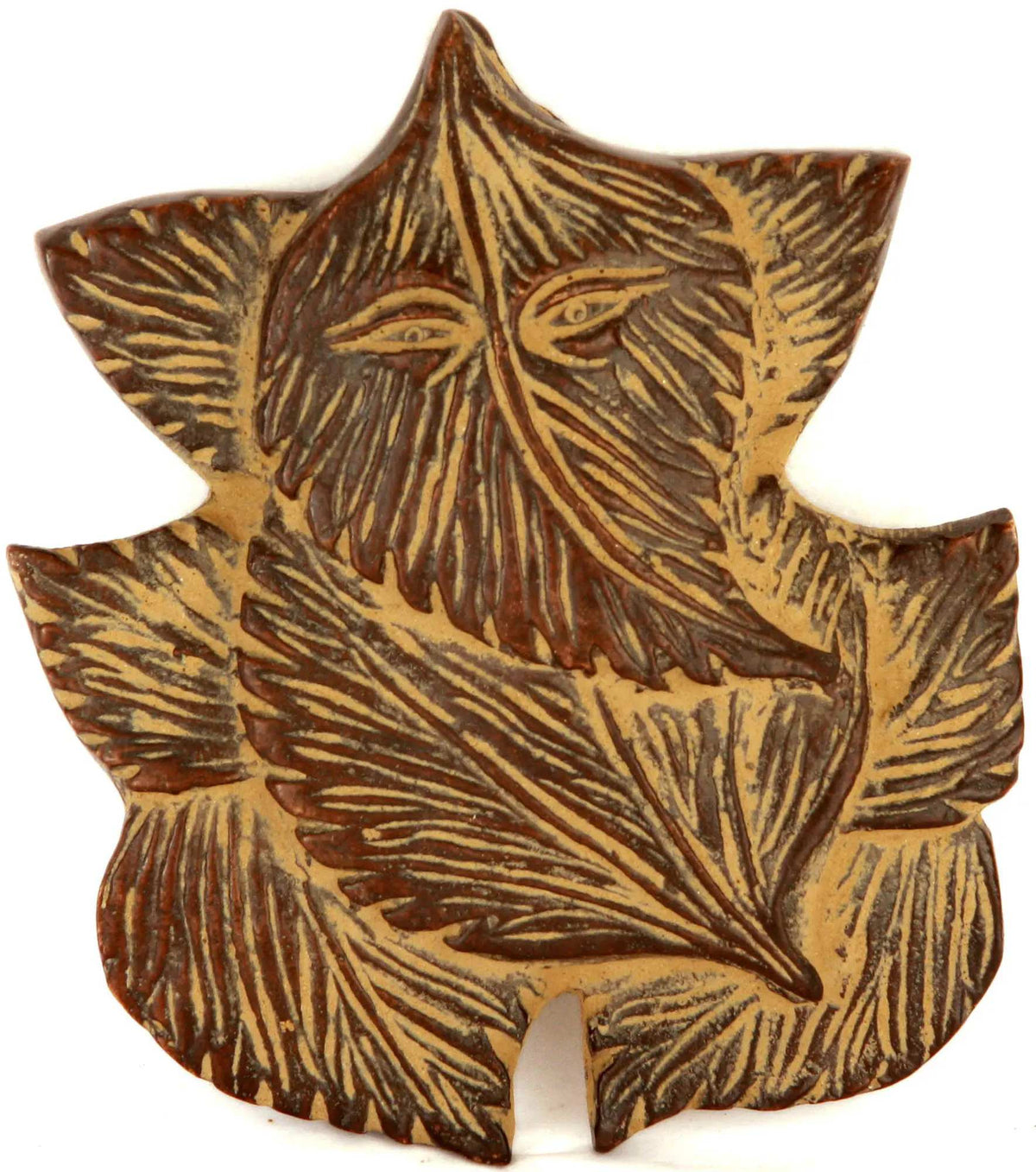 Brass Ganesha wall hanging statue with pipal leaf motif, detailed face and lines