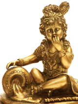 Messingfigur: kleiner Krishna, Butterdieb, sitzend mit Buttertopf; 8 Zoll